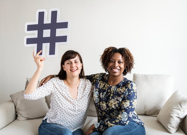 BS 2 women friends with social media hashtag icon