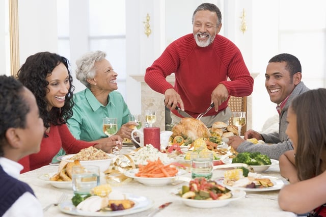 Happy family communication during thanksgiving dinner