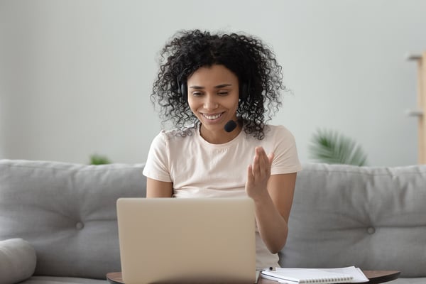 Remote virtual worker-African-Woman-Wearing-Headphone