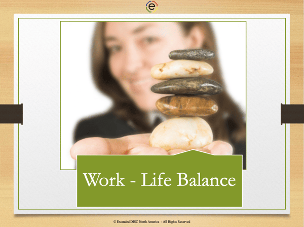 Work - life balance woman balancing a stack of rocks in hand