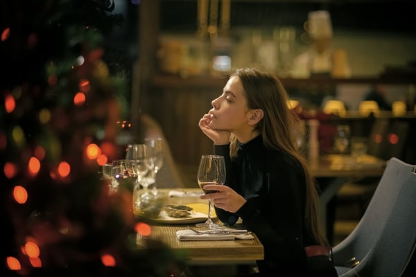 Solitary woman at party table