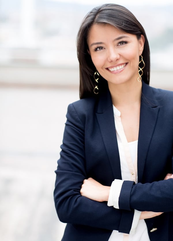 Casual business woman with arms crossed and smiling