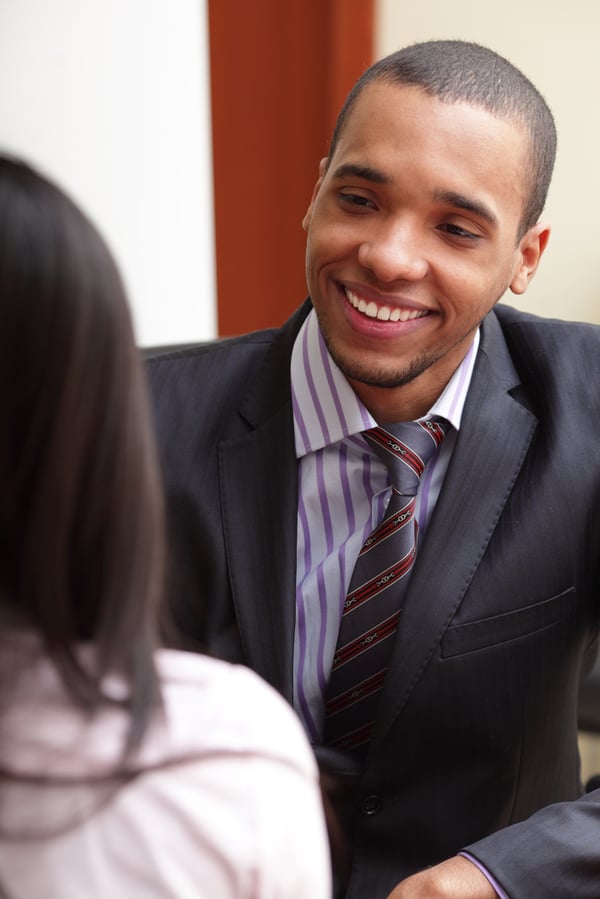 Two businesspartners having a conversation and laughing