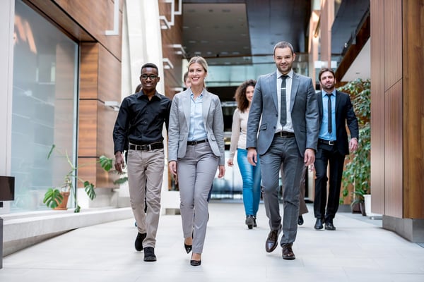 young diverse business leaders walking