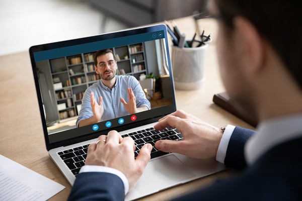 Virtual Remote Worker Male Man talking online with another man