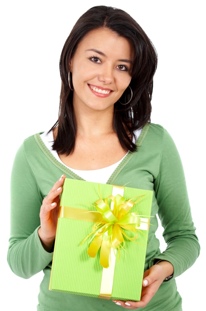 woman with a gift isolated over a white background